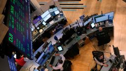 Traders work on the floor of the New York Stock Exchange on November 5, 2024.