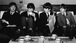 The Beatles take a break from their rehearsals with a coffee after lunch at the Mapleton Hotel in November 1963.